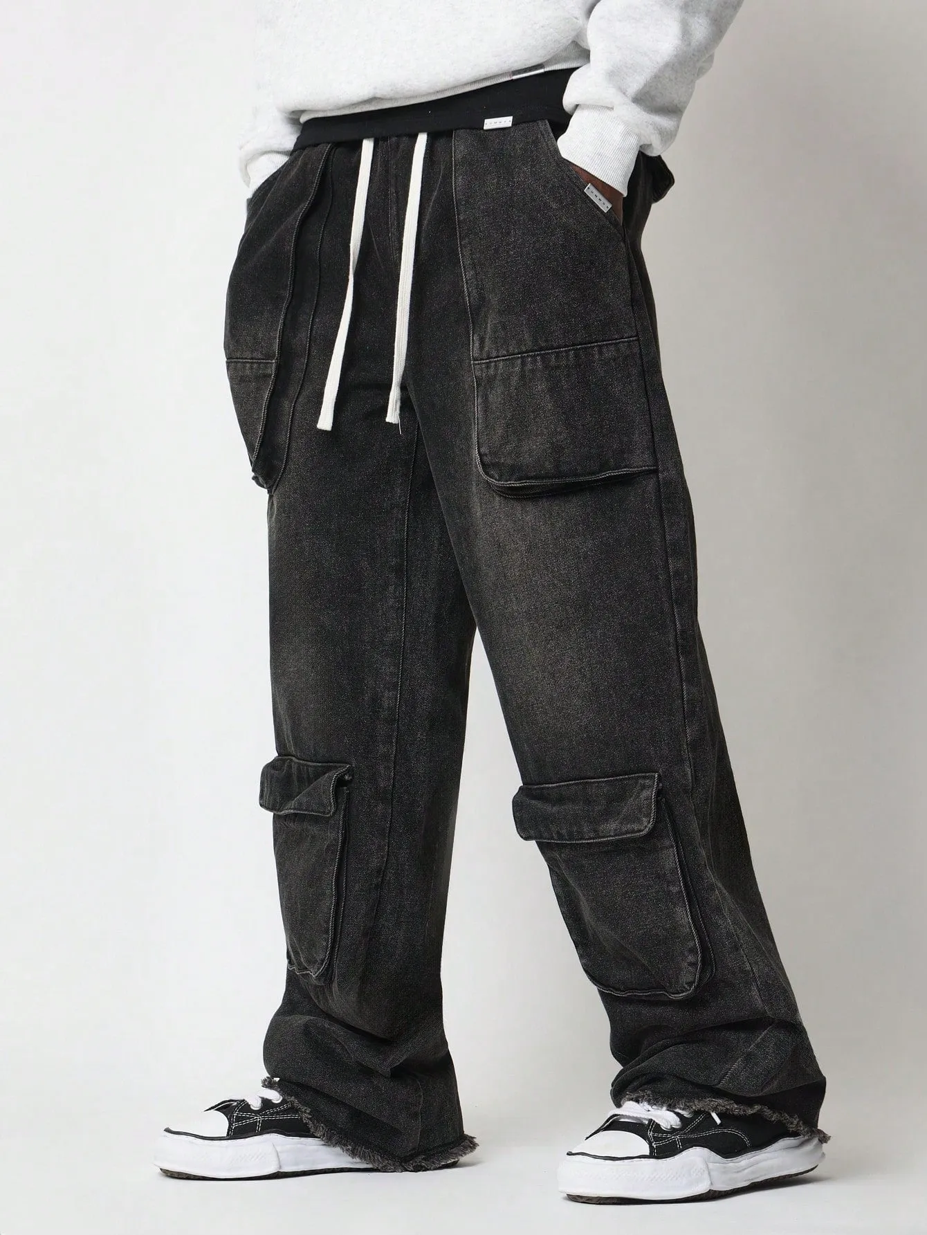 Loose Fit Raw Hem Cargo Jean With Drawcords