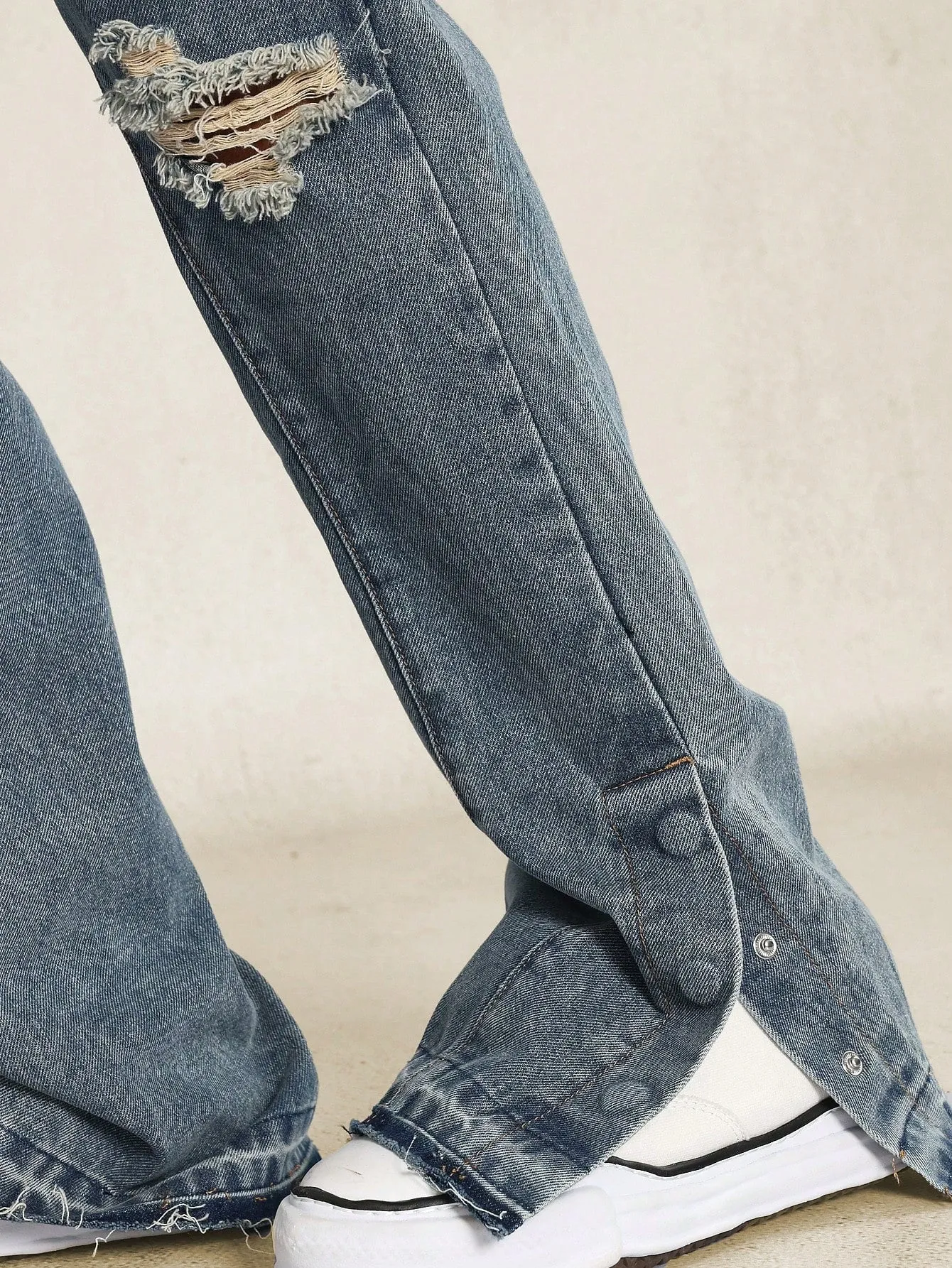 Slim Fit Ripped Denim Jean With Snap Button Side Split